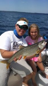 Maddie with a Lake Trout while fishing in Traverse City~ Storm Hawk Sport Fishing