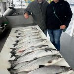 Customers with cisco and king salmon caught during an October fishing charter near Traverse City